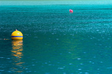 Yellow Buoy On Turquoise Sea