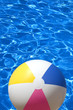 canvas print picture ball on the blue pool backround, focus point on the toy