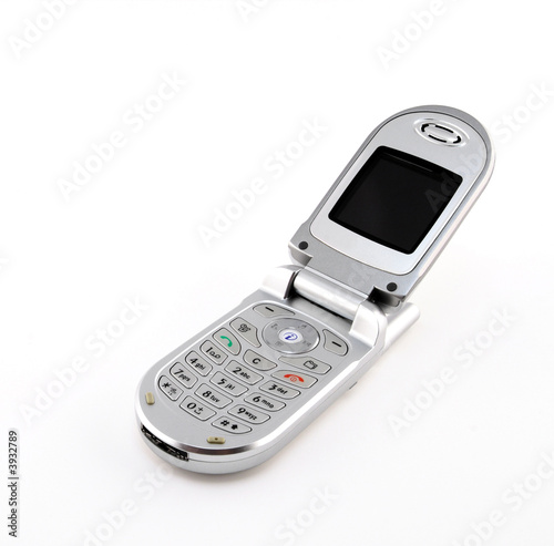 Fotografia, Obraz Silver clamshell cell phone isolated on white background.