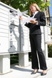 © Stephen Coburn - Business Woman Getting Mail
