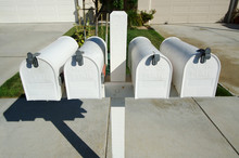 Absolutely White Row Of Mailboxes In Modern Neighborhood