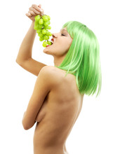 green hair girl with a bunch of grapes