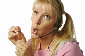 Bored Young Female Customer Support Telephone Operator.