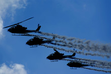 Silhouetted Helicopters