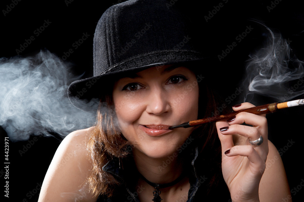Woman with cigarette holder Stock Photo