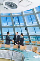 Poster - Handshake in conference room