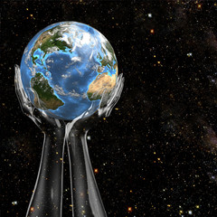 hands hold earth in space