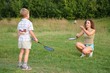 © Pavel Losevsky - mother and son play badminton