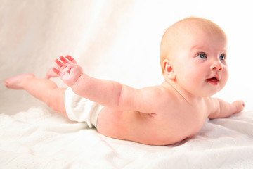 baby in 'flying' pose