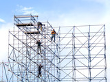Fototapeta  - Steeplejacks on a scaffold