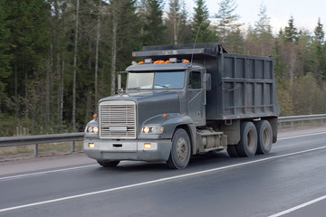 Wall Mural - truck driving on country-road of 