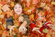 © sonya etchison - Boys Playing in the Leaves