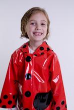 Child In Rain Coat
