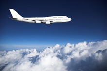 Jumbo Jet  Above Clouds