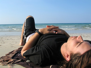 Man resting on the beach