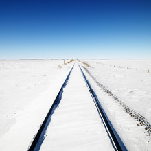 Snow Covered Railroad Tracks.