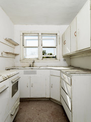 Empty dirty kitchen.