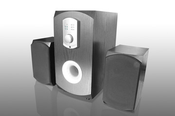 three black computer speakers with built in amplifier