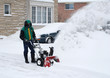 © Les Palenik - Clearing snow from driveway