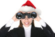 © Stephen Coburn - A pretty business woman with binoculars at Christmas