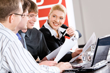 Wall Mural - Portrait of business people working together at meeting