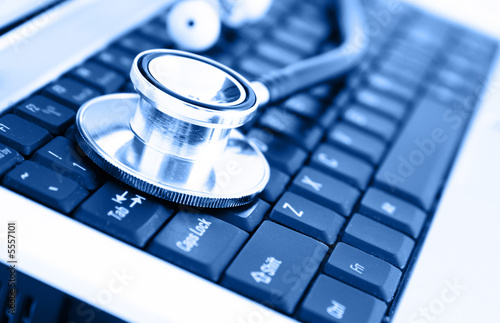 Fotografie, Obraz Close-up of stethoscope on laptop keyboard