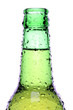 beer bottle isolated on white, wet green bottle closeup