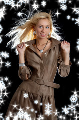 Wall Mural - dancing blond in brown dress with snowflakes and twinkles