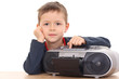 © matka_Wariatka - cute 6 years old boy listening to music isolated on white