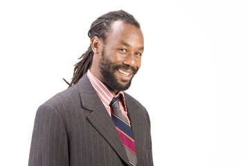 Wall Mural - A black man with dreadlock hair isolated on a white background.