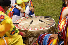 Indians Around A Drum At A Pow Wow 