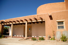 Adobe House On A Bright Summer Day In Taos, New Mexico