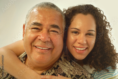 Fotografie, Obraz Studio portrait of father and daughter laughing and being happy