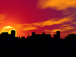 Silhouette of a city in sunset.
