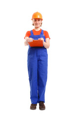 Wall Mural - Female site manager in blue jumpsuit taking records