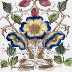 An Art Nouveau tile dating around 1890 with flower design