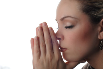 Wall Mural - a woman is praying to god with hope