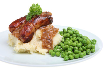 Wall Mural - Pork sausages with mashed potato, peas and onion gravy