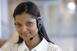 © carlosseller - Young smiling call center woman