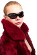 © Indigo Fish - Woman in a fur coat and sunglasses