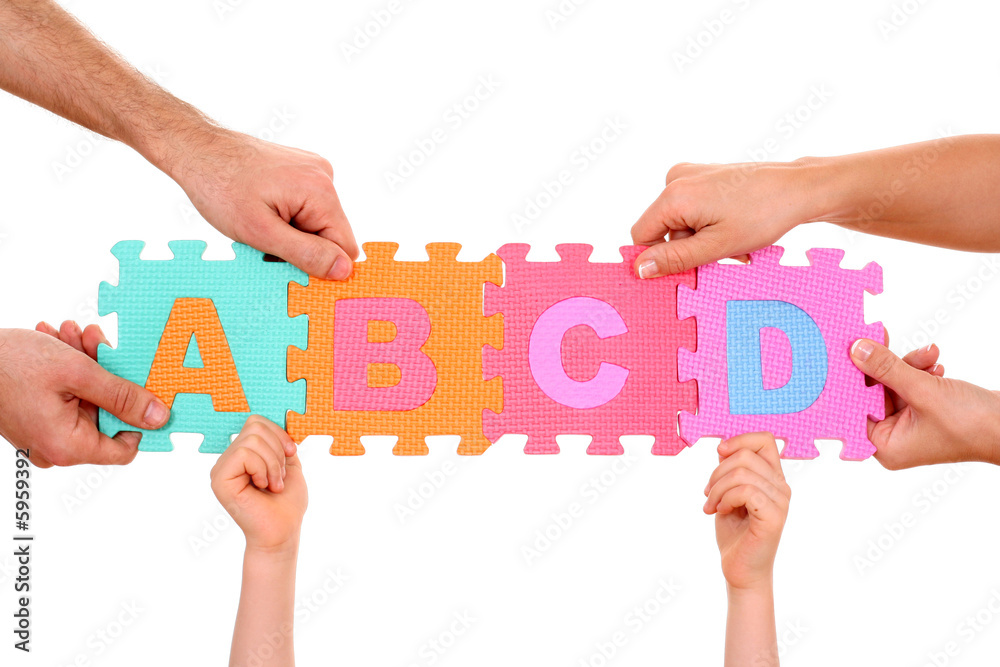 hands holding puzzle with ABCD letters isolated on white Stock Photo ...