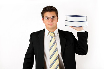 young businessman with two books over white background