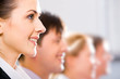 © pressmaster - Row of half faces of young successful professionals