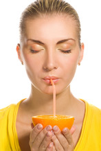 Beautiful Girl Drinks Natural Orange Juice