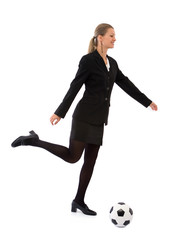 Wall Mural - young businesswoman with a soccer ball on white background