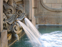 Fountain With Two Fish Heads In Barcelona, Spain