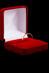 Poster - wedding ring on black background