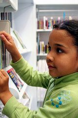 Child in a school library