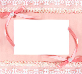 Post card with blank sheet of paper and two bows.