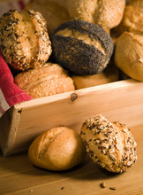 Detail Of Old Bakery, Rolls With Different Seeds In Wooden Box 